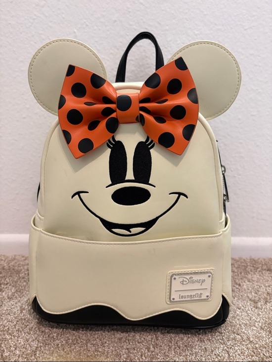 Loungefly Cream Minnie Mouse Backpack with Orange and Black Polka Dot Bow Glows